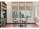 Cozy breakfast nook with views to an outdoor space, perfect for enjoying morning coffee at 43 Hasell St, Charleston, SC 29401