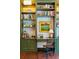 Close up of custom office built ins showing shelves, desk and cabinet storage at 43 Hasell St, Charleston, SC 29401
