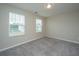 Bedroom featuring neutral carpet and two windows with natural light at 430 Pender Woods Dr, Summerville, SC 29486