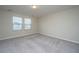 Bedroom with neutral carpet and two windows offering natural light at 430 Pender Woods Dr, Summerville, SC 29486