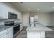 Kitchen featuring stainless steel appliances, granite countertops and white cabinetry at 430 Pender Woods Dr, Summerville, SC 29486