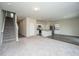 Spacious and inviting living space seamlessly connects the living room and kitchen at 430 Pender Woods Dr, Summerville, SC 29486