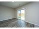 Bright living room with sliding glass doors leading to the backyard at 430 Pender Woods Dr, Summerville, SC 29486