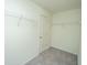 A simple walk-in closet space with wire shelving for organization and storage at 430 Pender Woods Dr, Summerville, SC 29486