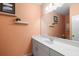 Cozy bathroom features white vanity with modern fixtures and decorative shelves at 4621 Holmes Ave, North Charleston, SC 29405