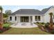 Gorgeous backyard with outdoor firepit, and a covered patio at 477 Yellow House Pl, Charleston, SC 29492