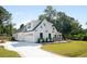 Stunning two-story home boasts manicured lawn and attached garage at 477 Yellow House Pl, Charleston, SC 29492