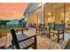 Charming back patio with ample seating and views of the picturesque backyard at 511 Ocean Mist Way, Summerville, SC 29486