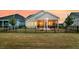 A home's fenced backyard with the rear exterior in view at 511 Ocean Mist Way, Summerville, SC 29486
