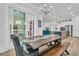 Open-concept dining room that flows to a bright kitchen and comfortable living space at 511 Ocean Mist Way, Summerville, SC 29486