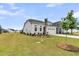 A quaint home with a manicured front yard, featuring a tree on a sunny day at 511 Ocean Mist Way, Summerville, SC 29486