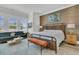 Spacious main bedroom featuring a sitting area, designer rug, and stylish decor at 511 Ocean Mist Way, Summerville, SC 29486