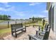 Beautiful patio with comfortable seating and tranquil views of the lake and backyard at 511 Ocean Mist Way, Summerville, SC 29486