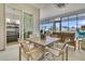 Covered patio featuring a dining table with seating and sliding glass doors, offering seamless indoor-outdoor living at 511 Ocean Mist Way, Summerville, SC 29486