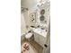 Cozy bathroom featuring a shower-tub combo with white shower curtain, vanity, and decorated mirror at 519 Parkdale Dr # J, Charleston, SC 29414