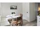 Charming dining area with corner seating, a round table, and natural light at 519 Parkdale Dr # J, Charleston, SC 29414