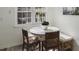 Charming dining area with corner seating, a round table, and natural light at 519 Parkdale Dr # J, Charleston, SC 29414