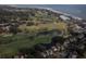 Scenic aerial view of a golf course community with lush greenery, ponds and stylish homes at 554 Double Eagle Trce, Seabrook Island, SC 29455