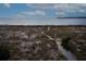 Scenic beach and tranquil ocean view with sand dunes, peaceful walking path, and distant horizon at 554 Double Eagle Trce, Seabrook Island, SC 29455