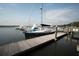 Dockside view showcasing a sleek yacht and calm waters near the shore at 554 Double Eagle Trce, Seabrook Island, SC 29455