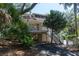 Charming elevated home with a porch, stairs, and an American flag flying out front at 554 Double Eagle Trce, Seabrook Island, SC 29455