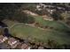Aerial view showcasing the meticulously landscaped golf course winding through a luxury home community at 554 Double Eagle Trce, Seabrook Island, SC 29455