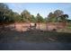 Spacious horse pen surrounded by trees and foliage, perfect for outdoor horse activities at 554 Double Eagle Trce, Seabrook Island, SC 29455