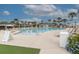 Inviting outdoor pool surrounded by lounge chairs and lush landscaping, ideal for relaxation at 554 Double Eagle Trce, Seabrook Island, SC 29455