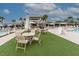 Relaxing poolside seating arrangement perfect for enjoying sunny days and cool drinks at 554 Double Eagle Trce, Seabrook Island, SC 29455