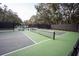 Well-maintained tennis court with new benches and net, perfect for enjoying a game at 554 Double Eagle Trce, Seabrook Island, SC 29455
