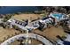 Stunning aerial view of the clubhouse, pool and surrounding landscape with a view of the lake at 555 Double Eagle, Seabrook Island, SC 29455