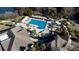 Community clubhouse with pool, sunshades, lounge chairs, and mature trees, all viewed from above at 555 Double Eagle, Seabrook Island, SC 29455
