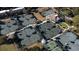 Aerial view of multiple well-maintained tennis courts next to a charming clubhouse at 555 Double Eagle, Seabrook Island, SC 29455