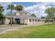 Large equestrian barn with spacious stalls, ample natural light, and extensive grounds, perfect for horse enthusiasts at 555 Double Eagle, Seabrook Island, SC 29455