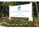 Seabrook Island Club Racquet Club sign with colorful flowers and greenery at 555 Double Eagle, Seabrook Island, SC 29455