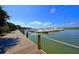 View of the docks with multiple boats, palm trees, and clear blue skies; a pleasant place to enjoy the waterfront at 555 Double Eagle, Seabrook Island, SC 29455