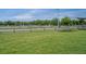 Equestrian ring with jumps and well-maintained grass, set against a backdrop of trees and a clear sky for riding activities at 555 Double Eagle, Seabrook Island, SC 29455