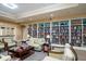 Relaxing library with large bookcase, fireplace, plenty of seating, and reading material at 555 Double Eagle, Seabrook Island, SC 29455
