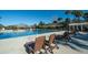 Community pool includes covered area, lounge chairs, mature landscaping, and an expansive deck area at 555 Double Eagle, Seabrook Island, SC 29455