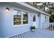 Inviting porch with gray floors and charming details offering a cozy spot to enjoy views at 555 Double Eagle, Seabrook Island, SC 29455