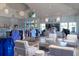 Bright retail space features contemporary displays with varied sporting goods and stylish apparel for an upscale shopping experience at 555 Double Eagle, Seabrook Island, SC 29455