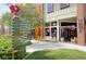 Shops with brick and wood detailing and outdoor seating, offering a variety of services and a welcoming environment at 555 Double Eagle, Seabrook Island, SC 29455