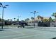 A well-maintained tennis court complete with benches, shade, and lighting for evening games at 555 Double Eagle, Seabrook Island, SC 29455