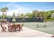 Well maintained tennis court with green surface and a nice seating area at 555 Double Eagle, Seabrook Island, SC 29455