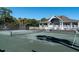 Stunning tennis court with well-maintained surface, next to clubhouse and lush greenery offers a perfect active lifestyle at 555 Double Eagle, Seabrook Island, SC 29455