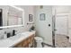 Stylish bathroom with a modern vanity, patterned tile flooring, and an LED mirror at 60 Fenwick Hall Allee # 432, Johns Island, SC 29455
