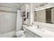 Bathroom with white vanity, updated fixtures, shower with tub, and cabinet for storage at 60 Fenwick Hall Allee # 432, Johns Island, SC 29455