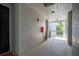 Hallway of a building featuring concrete walls, fire hydrant, topiary, and outdoor view at 60 Fenwick Hall Allee # 432, Johns Island, SC 29455
