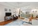 Open-concept living room featuring hardwood floors, and integrated kitchen and dining areas at 60 Fenwick Hall Allee # 432, Johns Island, SC 29455