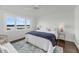 Serene bedroom with ample natural light, featuring a comfortable bed, and a relaxing ambiance with waterfront views at 63 Mariners Cay, Folly Beach, SC 29439